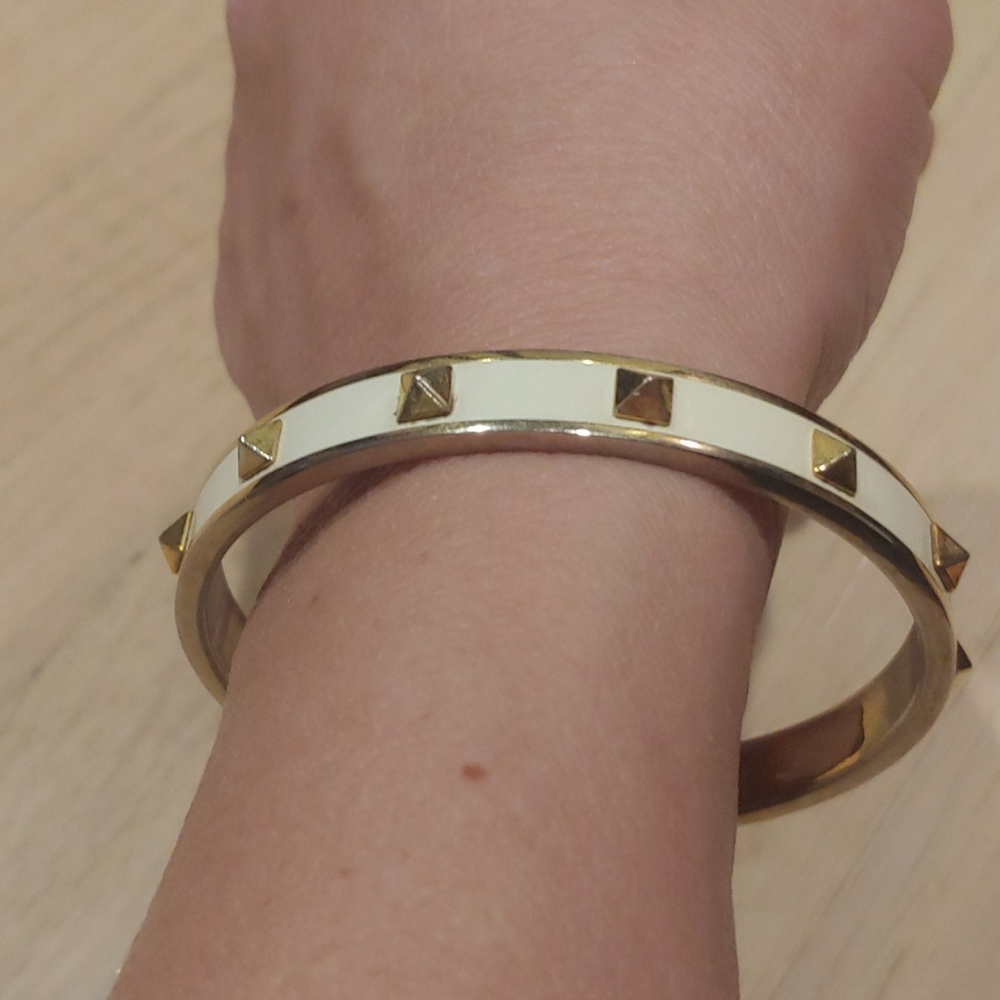 Coach Bangle white with gold spikes